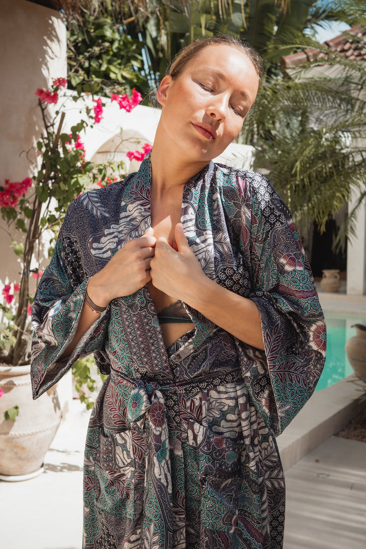 a woman wearing silk Kimono Robe Handmade in Bali