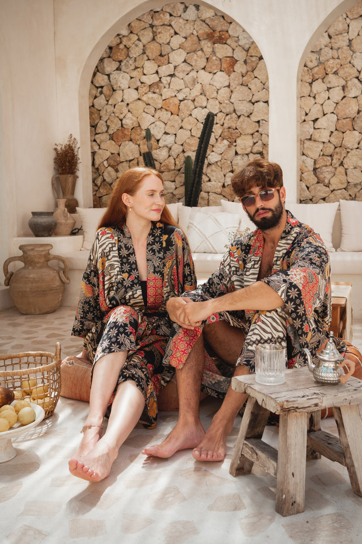 a couple sitting and wearing balinese Silk Kimono Robes