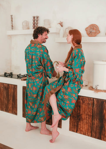 A couple wearing Unisex Teal Floral Silk Kimono Robe