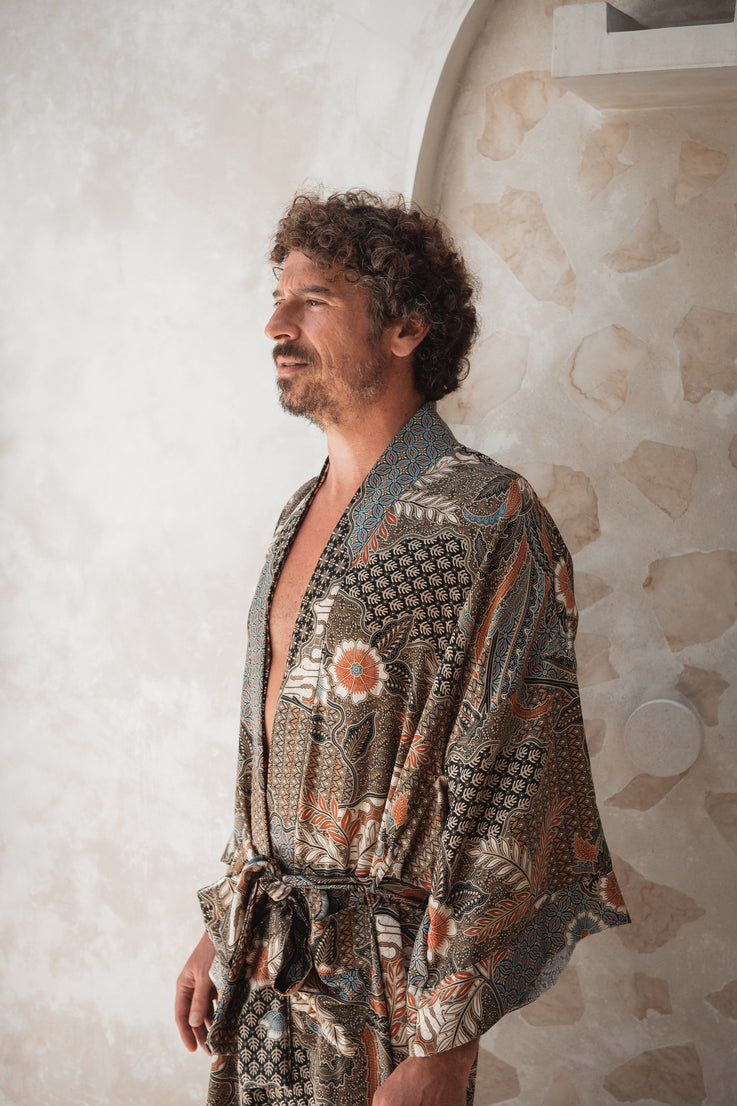 a man wearing balinese silk kimono robe